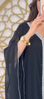 عباءة فاخرة+فستان أنيق —  بسعر قطعة واحدة